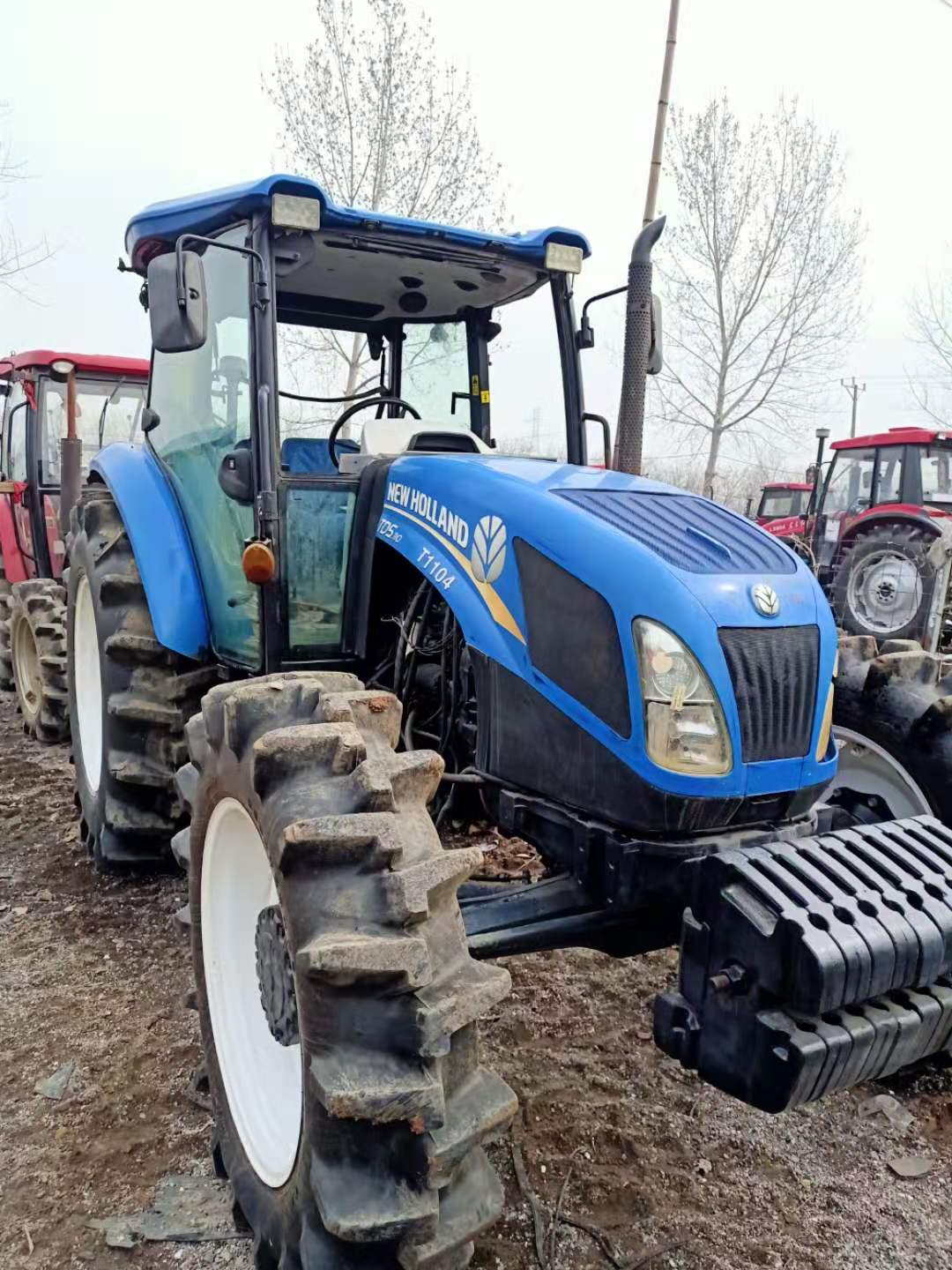 Cas de tracteur usagé Nouveau Holland T1104 Equipements de tracteur T1104